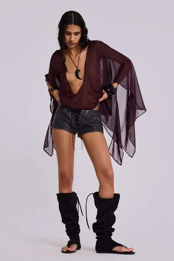 Vaca Whipstitch Faux Leather Mini Shorts in Black